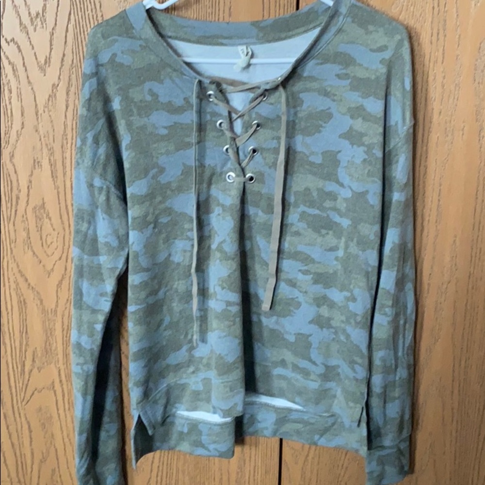 Camo top with open tie at upper chest